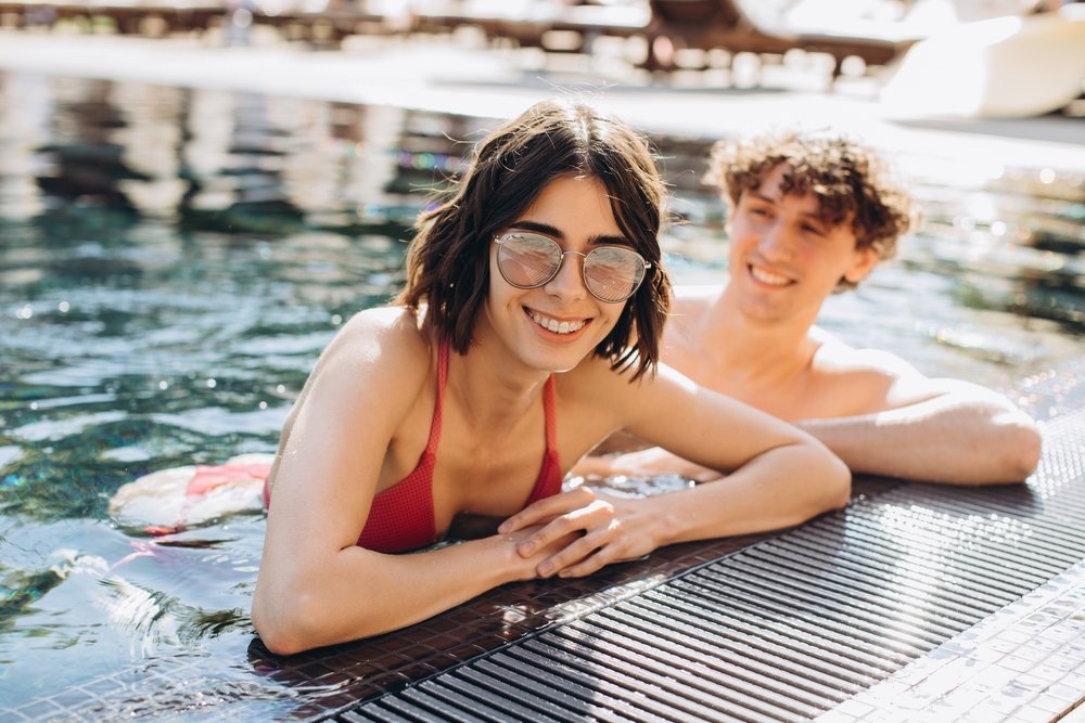 Fun, Face, Smile, Water, Glasses, Muscle, Vision care, Human body, Brassiere, Happy, Flash photography