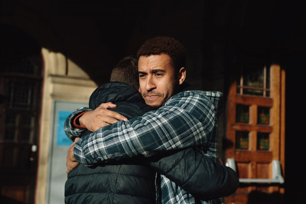 Two Men Hugging Sad, Flash photography, Gesture